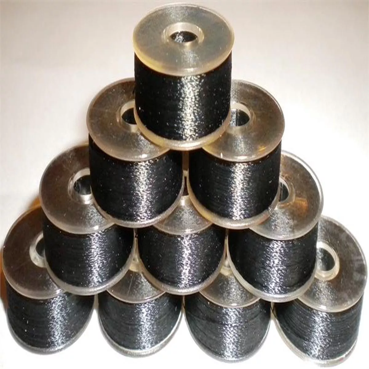 100-prewound-size-l-plastic-sided-embroidery-bobbins 100 Prewound Size L Plastic Sided Embroidery Bobbins