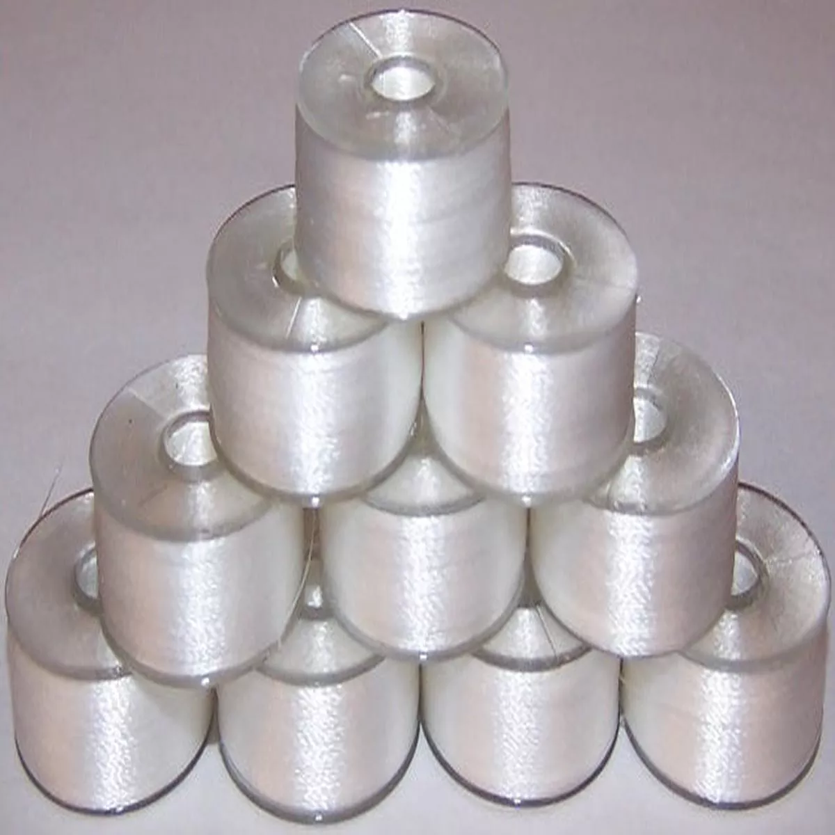 24-prewound-size-l-plastic-sided-embroidery-bobbins 24 Prewound Size L Plastic Sided Embroidery Bobbins
