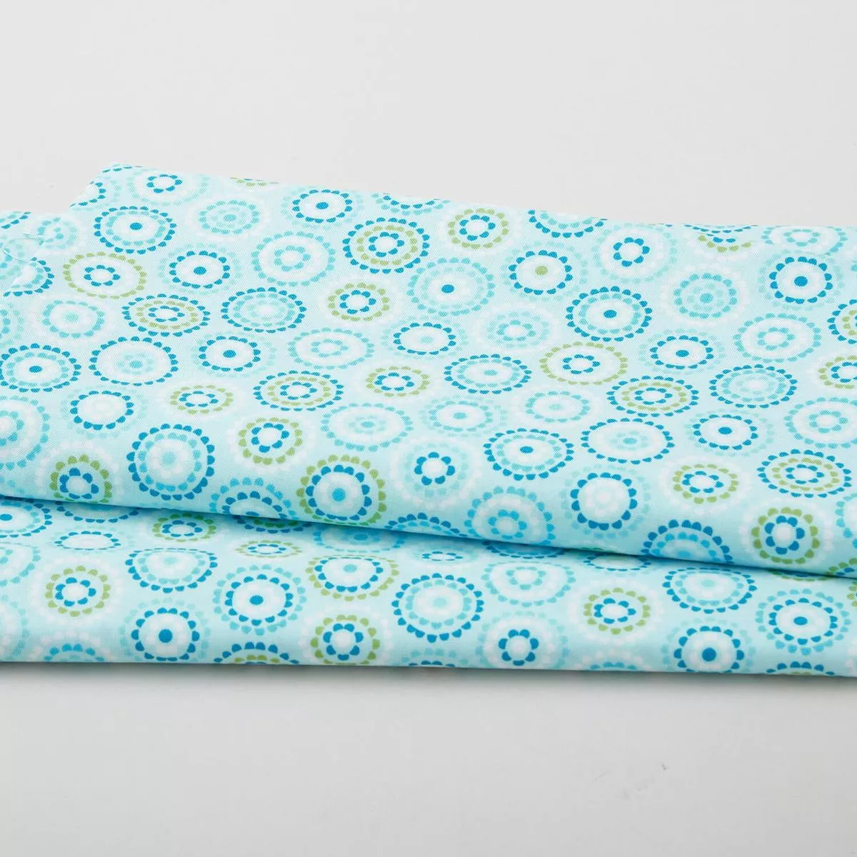 Daisy Up – Rings Turquoise 2 Yard Cut