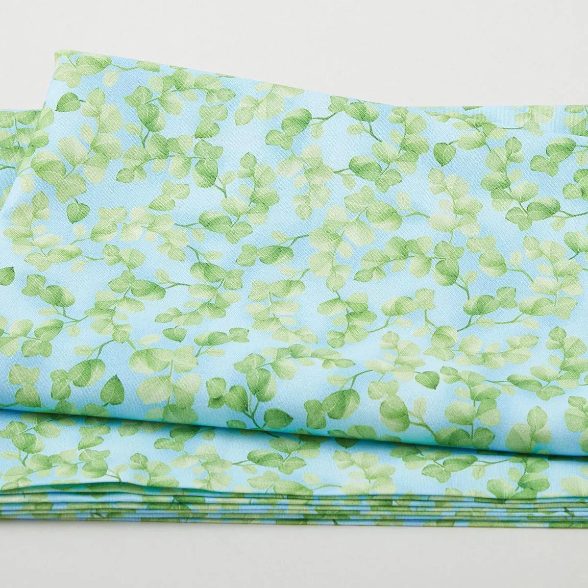 wondrous-woodland-packed-leaf-aqua-2-yard-cut Wondrous Woodland – Packed Leaf Aqua 2 Yard Cut